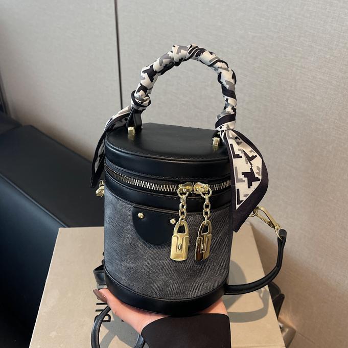 Color contrastante simple bolso de cubo de mano para mujeres 2024 nueva moda versátil mochila mochila de tela extranjera bolso de hombro