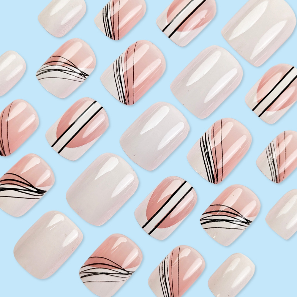 Líneas de color rosa y blanco estilo artístico de manicure, uñas cortas transfronterizas de venta caliente para vestir 24 piezas de parche de uñas empaquetado