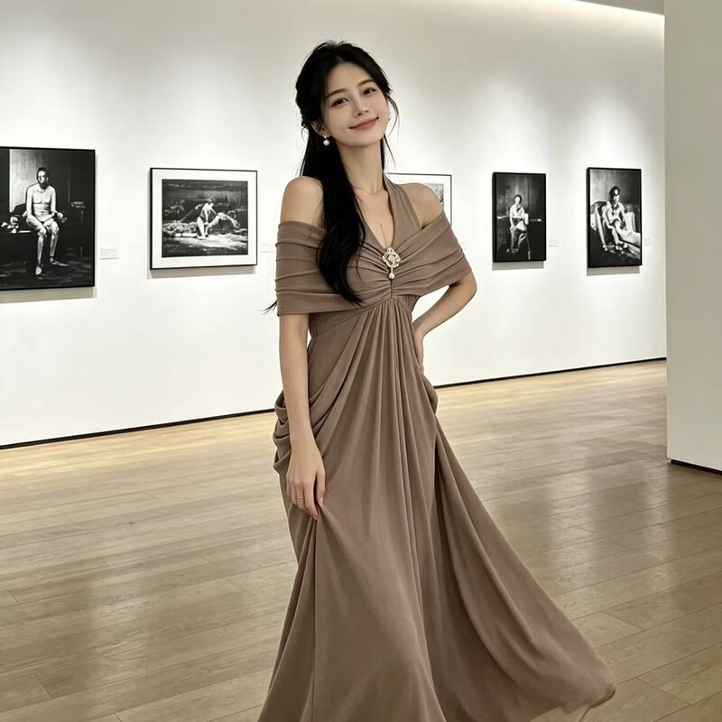 French-style, high-end, and luxurious evening gown with a halter neck design, featuring a new, slightly fitted, pleated, and body-hugging long dress style