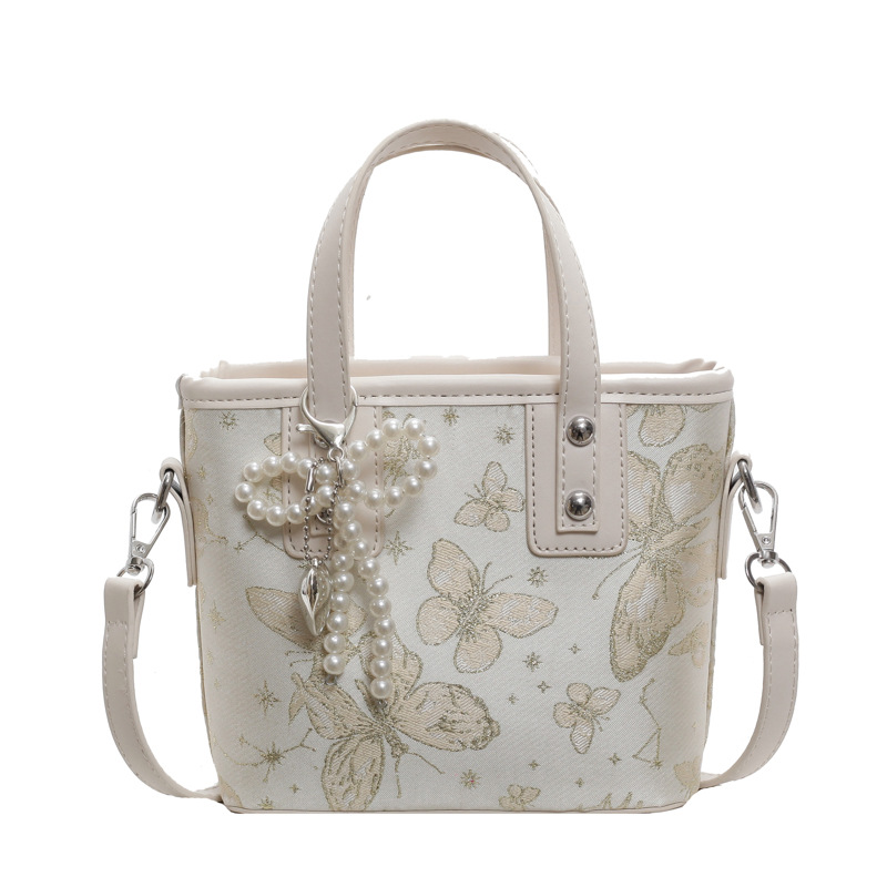 Bolsa de cubo de mano para mujeres 2025 nuevo estilo nacional popular bolso de hombro alta textura versátil bolso de moda moda