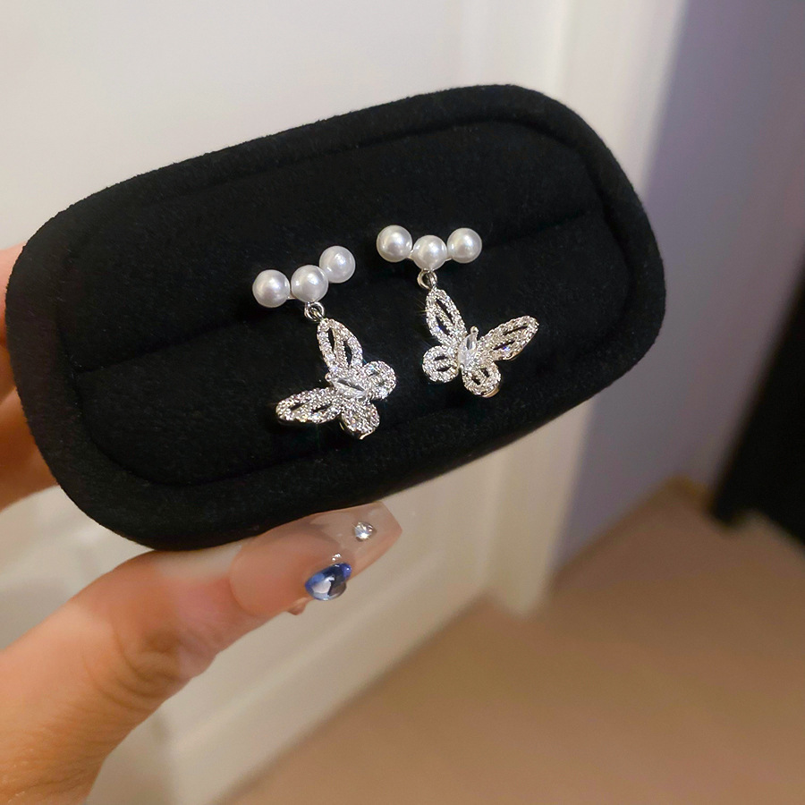 Pendientes de perlas de flor de circón de aguja de plata, pendientes de lujo de alta gama de lujo ligero exquisito, pendientes de todo fósforo blanco de moda de nicho al por mayor