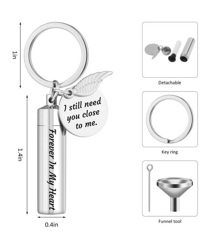 Venta caliente transfronteriza nombre de acero inoxidable grabado cenizas llavero titanio acero perfume esencial aceite botella cenizas caja llavero