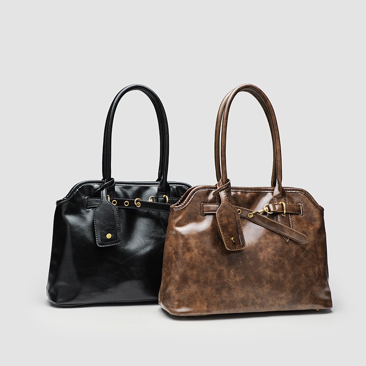 Bolso maletín retro perezoso para mujer, textura de gran capacidad, diseño de nicho simple y versátil, bolso portátil de un solo hombro