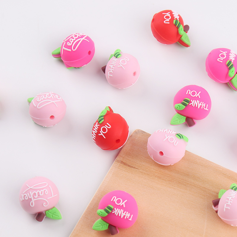 Productos creativos para bebés DIY dibujos animados de doble cara manzana joyas de silicona pezón de bebé anti-caída cadena accesorios de goma de diente