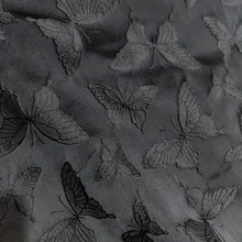 厂家动物色织蝴蝶提花布凹凸浮雕肌理布料连衣裙女装短裤手包面料