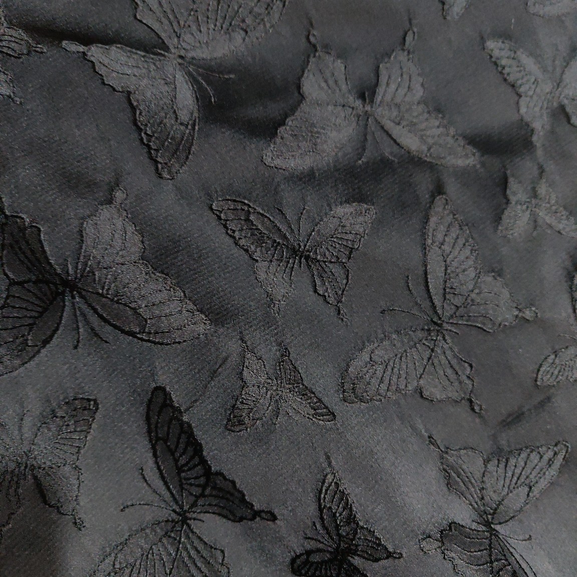 厂家动物色织蝴蝶提花布凹凸浮雕肌理布料连衣裙女装短裤手包面料