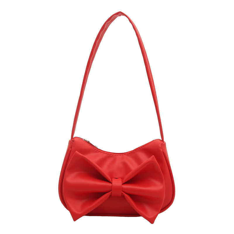 Bolso de axila con lazo de moda 2025 verano nuevo producto moda simple viajero estilo explosivo transfronterizo todo fósforo bolso femenino de un solo hombro