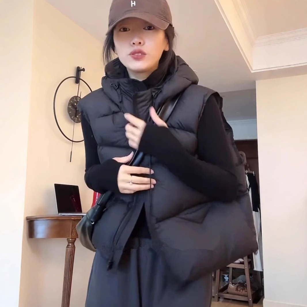 다운 재킷 조끼 코트 여자 2024 년 겨울 새 흰 오리 다운 조끼 한국 짧은 느슨한 조끼를 입고