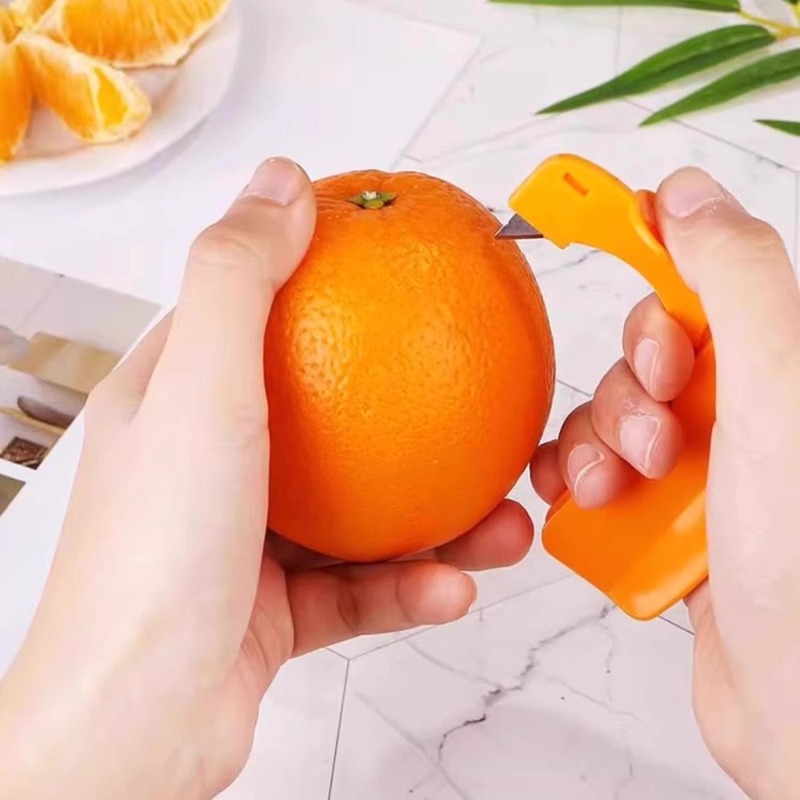 皮むき器は柚子を剥ぎ取って多機能のオレンジを剥ぎ取ってオレンジの柚子を剥ぎ取ってオレンジの神器の火竜果のザクロを剥ぎます。|undefined