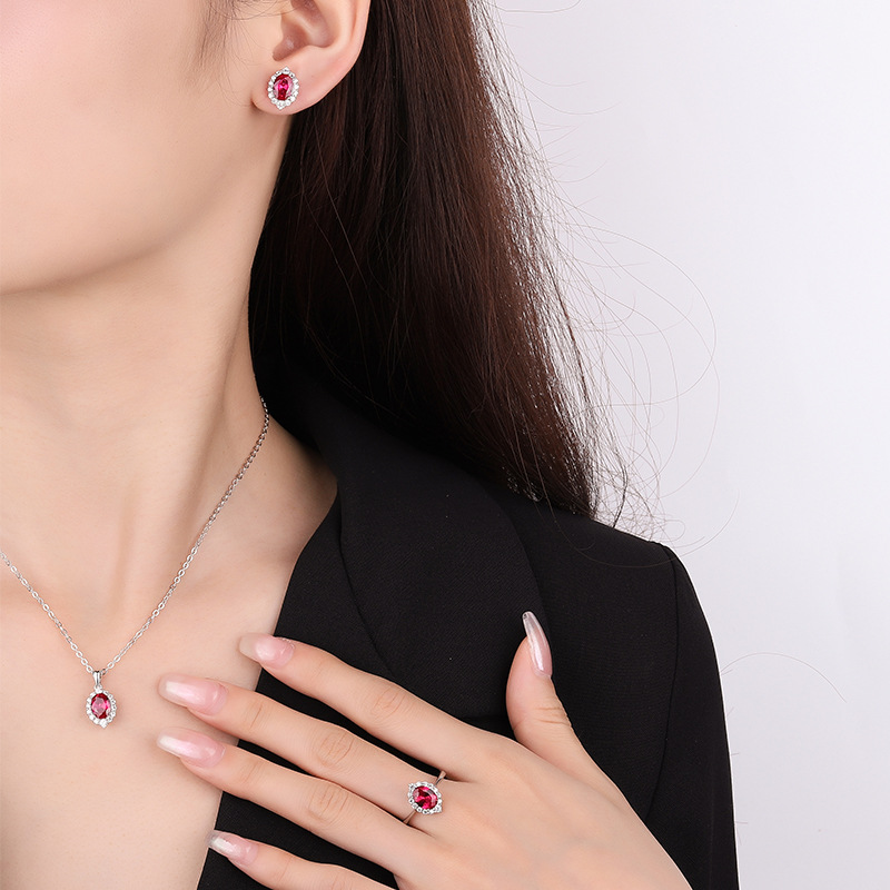 Zhuang Sheng joyería nueva S925 todo el cuerpo traje de plata color simulación tesoro pequeño huevo de paloma colgante piedra principal 6*8