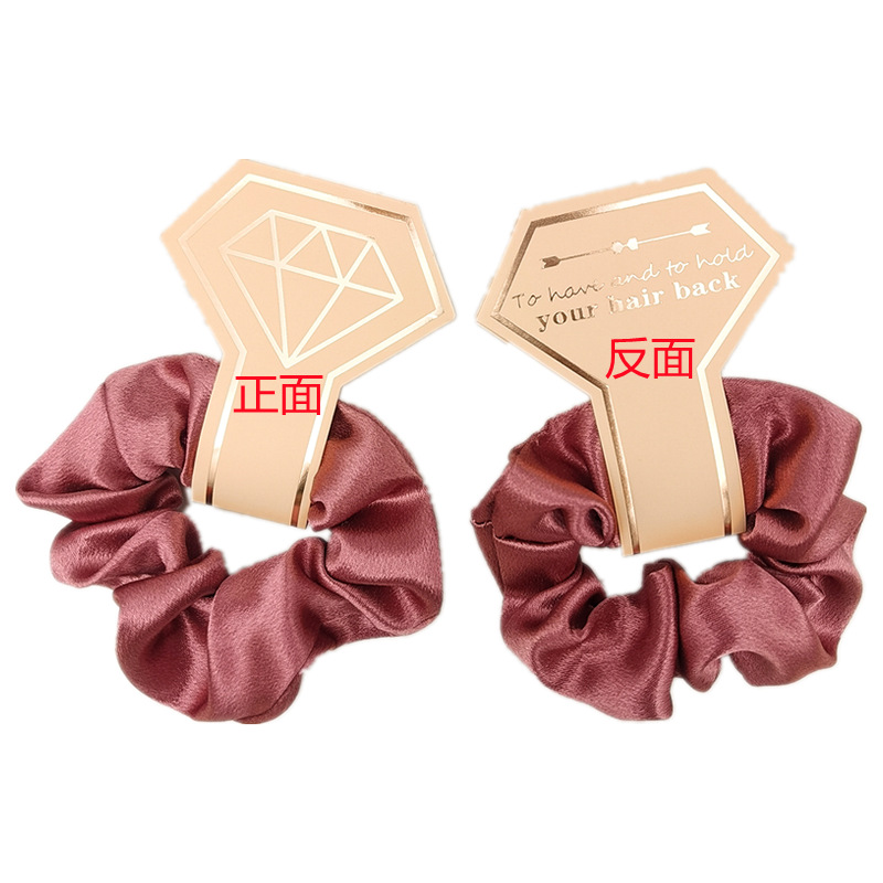 水晶缎吊卡正反对比图