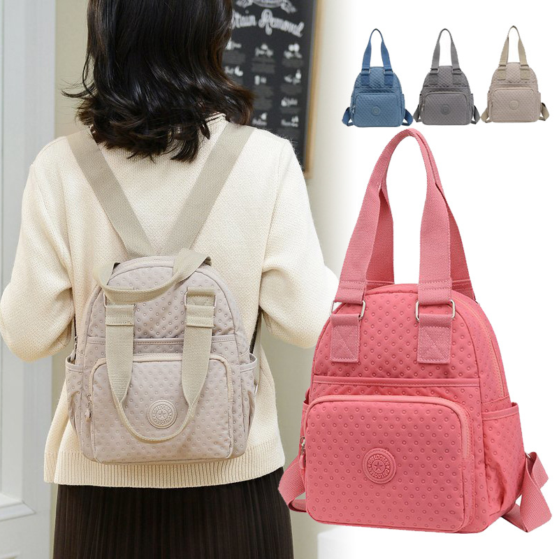 Suministro directo de fábrica mochila de mujer portátil oxford tela nylon bolsa de tela ligera transfronteriza bolsa de mujer mochila casual