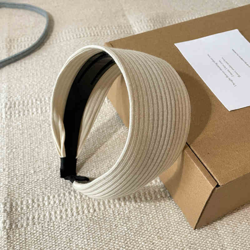 Otoño y invierno de alta sensibilidad para el cabello de mujeres cráneo alto borde amplio agujero de punto de banda de cabeza muestra cara pequeña gris ensanchada banda de cabello