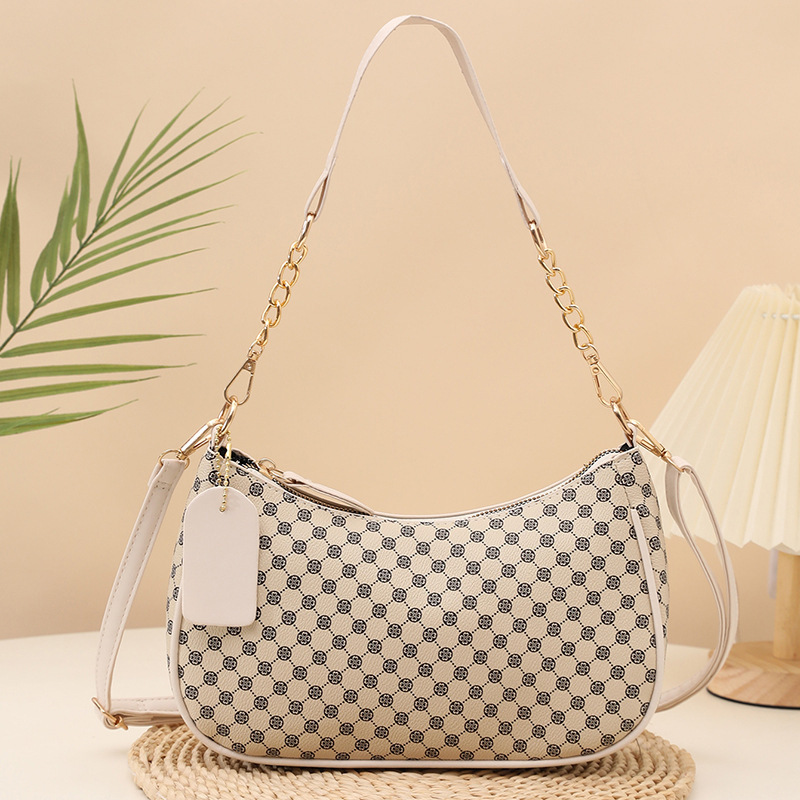 2025 nuevo bolso de mujer nuevo bolso de impresión personalidad bolso de hombro de moda bolso de maquillaje de viaje al comercio exterior lote