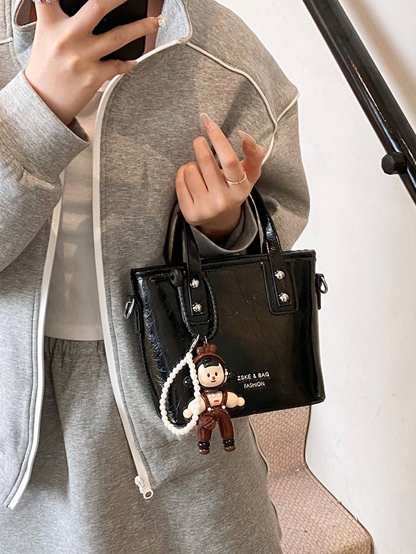 2025 nuevo nicho de moda bolso de cubo de mano para mujeres estilo coreano simple versátil bolso de hombro de moda mochila casual