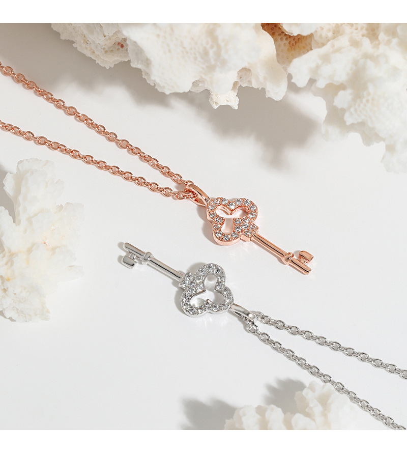 Colored gold clover zircon hollow short collarbone chain irregular INS minimalist artistic style lucky key necklace_voghion.com