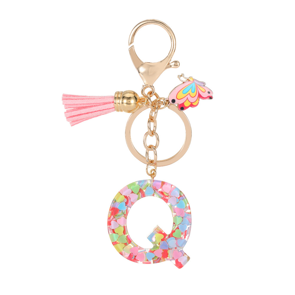 2024 puntos transfronterizos de resina de sequilla rosa 26 letras inglesas llavero colgante mariposa fringe accesorios