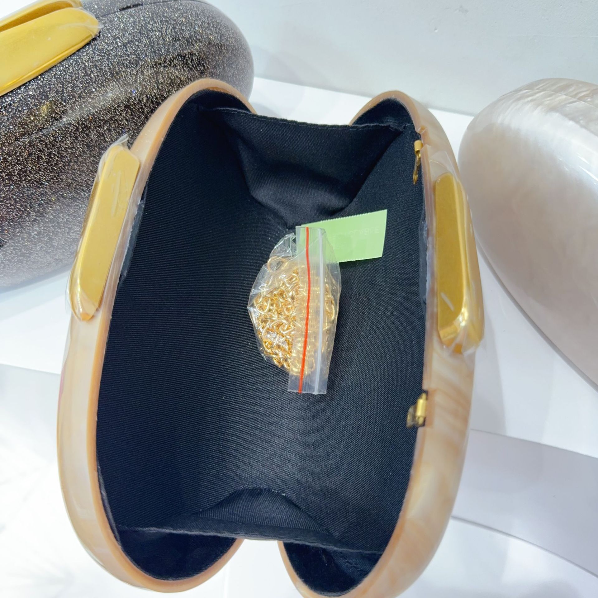 Nuevo paquete de cena de mujeres europeas y americanas transfronterizas un hombro inclinado en forma de concha acrílica bolsa de moda de boda vestido de noche mano