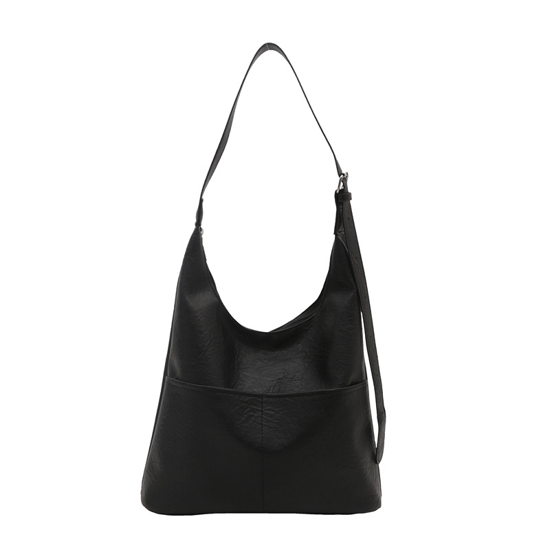 Bolso de mujer 2024, nuevo otoño y invierno de alta calidad, bolso de brazo de viaje simple, bolso de hombro de gran capacidad para mujeres.