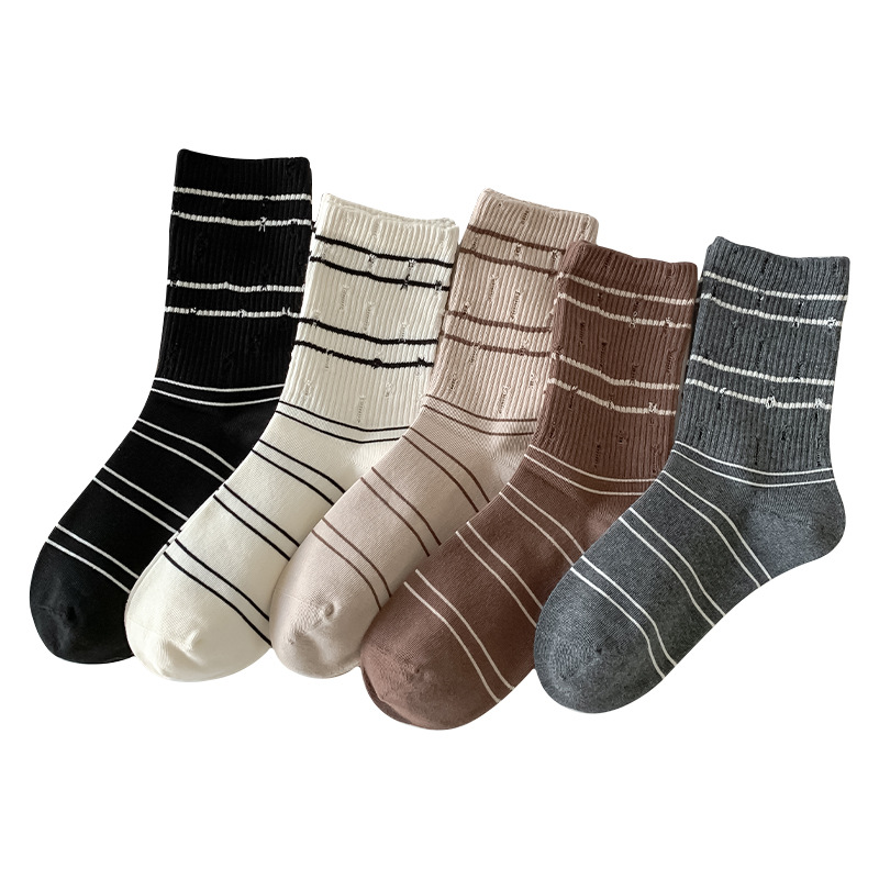 Piles de calcetines a rayas de mujer personalidad de tendencia otoño-invierno calcetines de algodón sin hueso al por mayor
