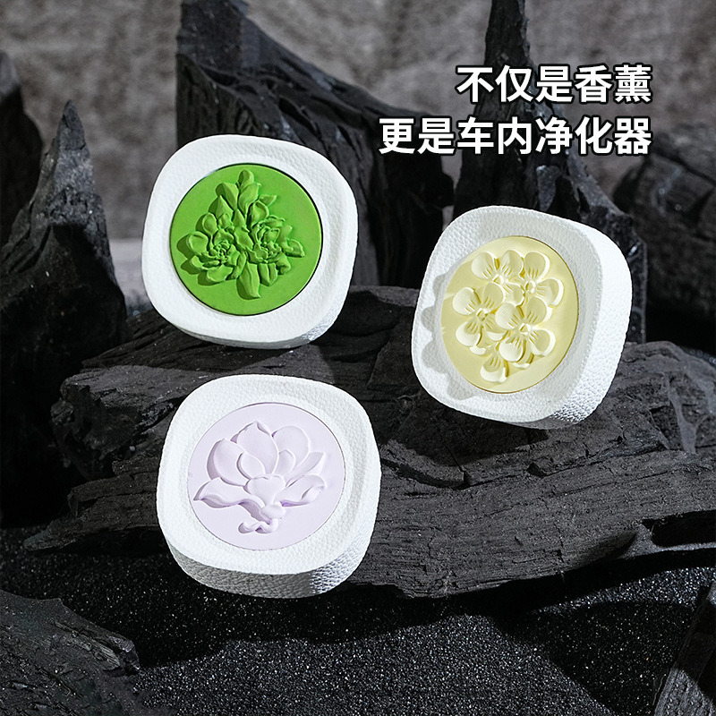 クチナシの花の車の上で風口の香薫の皮の紋様の革の石膏の拡香の石の車内の香水の置物の高級なエアコンの装飾|undefined
