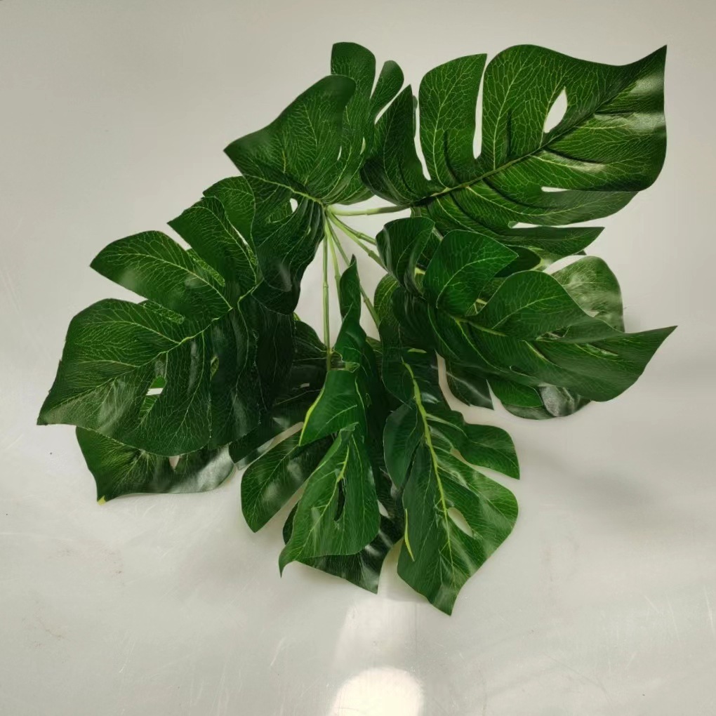 Flor de simulación al por mayor 9 hojas de monstera de simulación verde sobre pegamento Monstera simulación de pared de plantas flor de simulación