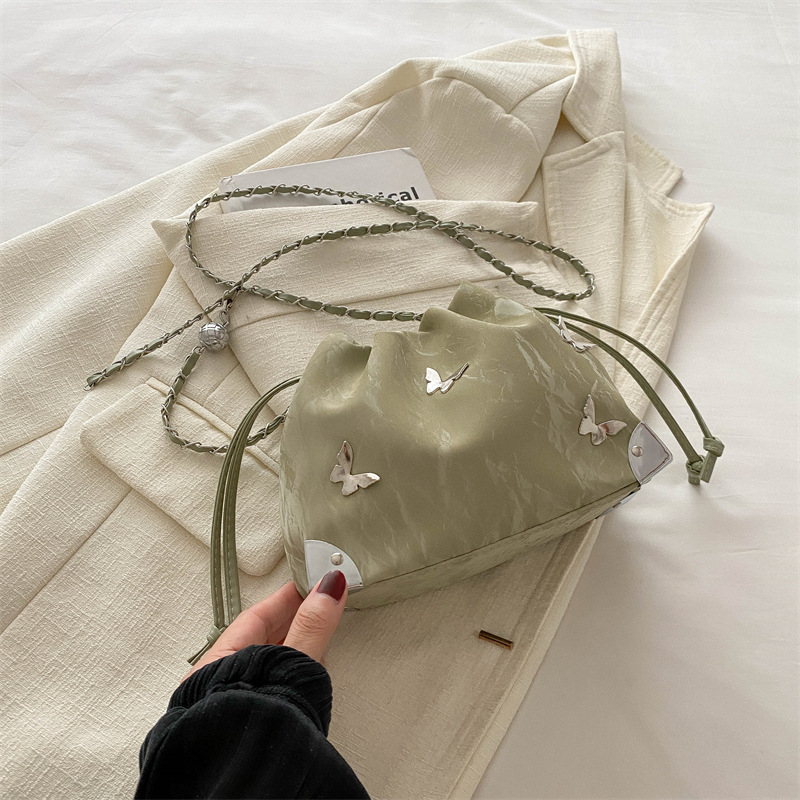 Bolso de cubo de mariposa súper fuego popular de este año primavera y verano nuevo bolso de cadena de todo fósforo de verano de moda bolso de hombro bandolera