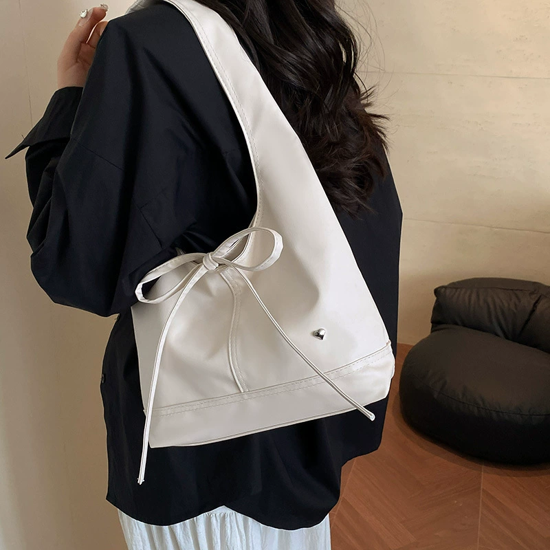 Small design universal capacious one-shoulder bag for leisure with bow, shoulder bag