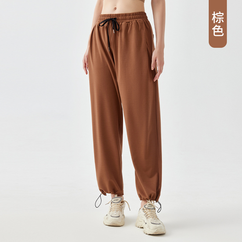 2024 Otoño e Invierno Nuevos pantalones de yoga de talla grande Pantalones de fitness de bolsillo europeos y americanos para mujer con cordón de cintura alta para adelgazar pantalones largos al por mayor