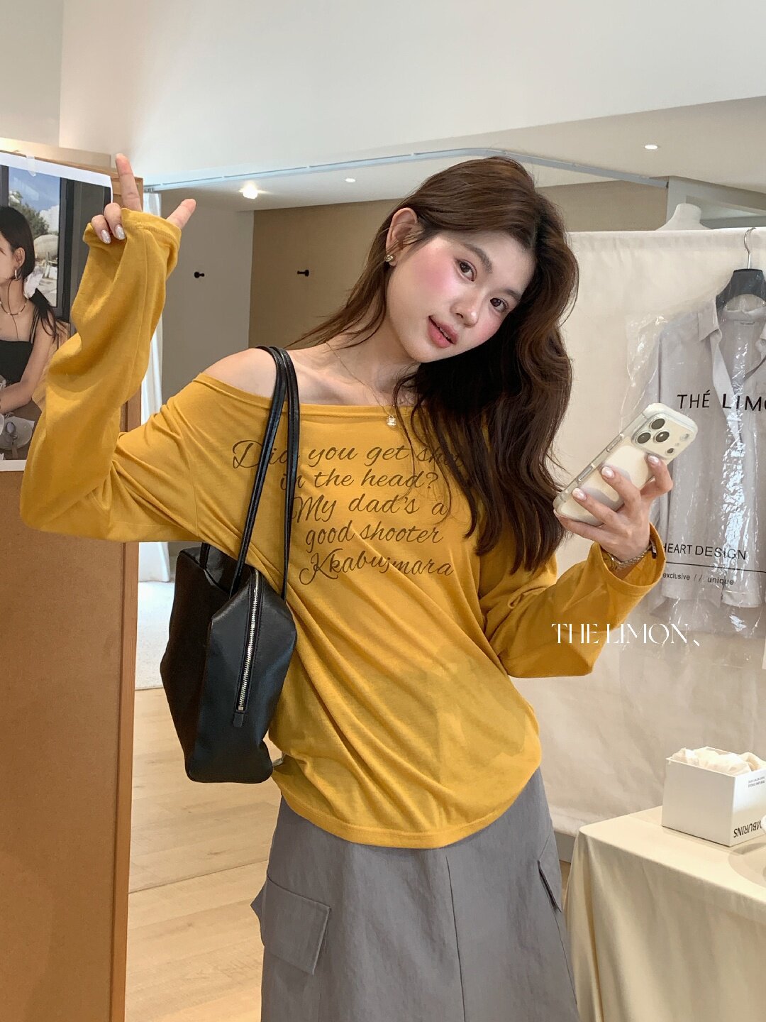 Áo thun nữ tay dài cổ tròn in chữ, phong cách Hàn Quốc, chất liệu cotton thoáng mát — màu đen, màu trắng, màu xám, màu vàng chi tiết 39