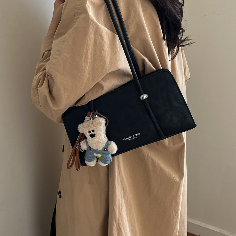 Simple retro bolso pequeño para mujeres 2026 nuevo bolso de estilo extranjero super caliente nicho diseño diario viaje bolsa de hombro