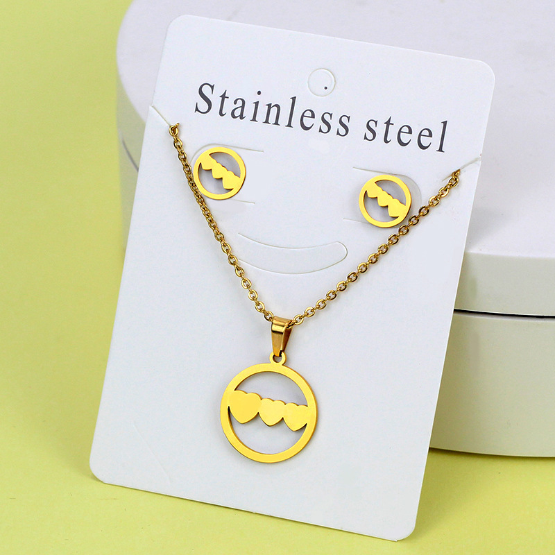 Conjunto de collar de pendientes de oro de acero inoxidable europeo y americano, collar de mariposa de amor de diamante, colgante, cadena de clavícula, fábrica al por mayor