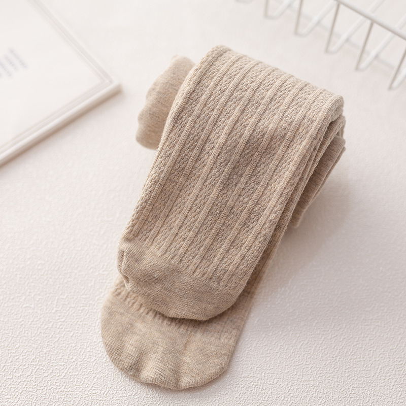 秋冬のベルベット麻花磨毛は子供のパンストの現物卸売りの新しい女の子が保温して足のズボンを踏む