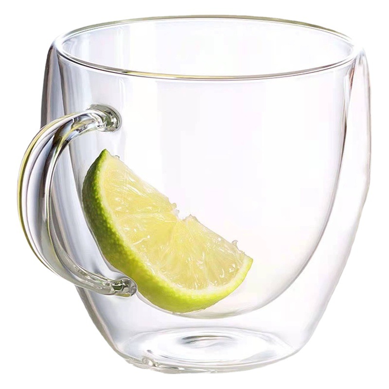 Fábrica al por mayor aislado de doble capa de leche de vidrio transparente taza de agua de vidrio con mango hogar oreja plana taza de café