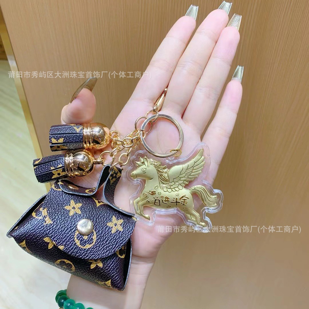 Año del Caballo de oro llavero de automóvil pequeño colgante 999 dinero de inmediato bolso llavero personalizado pequeño regalo