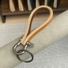 Caramel colored cowhide + ancient silver hardware (zinc alloy)