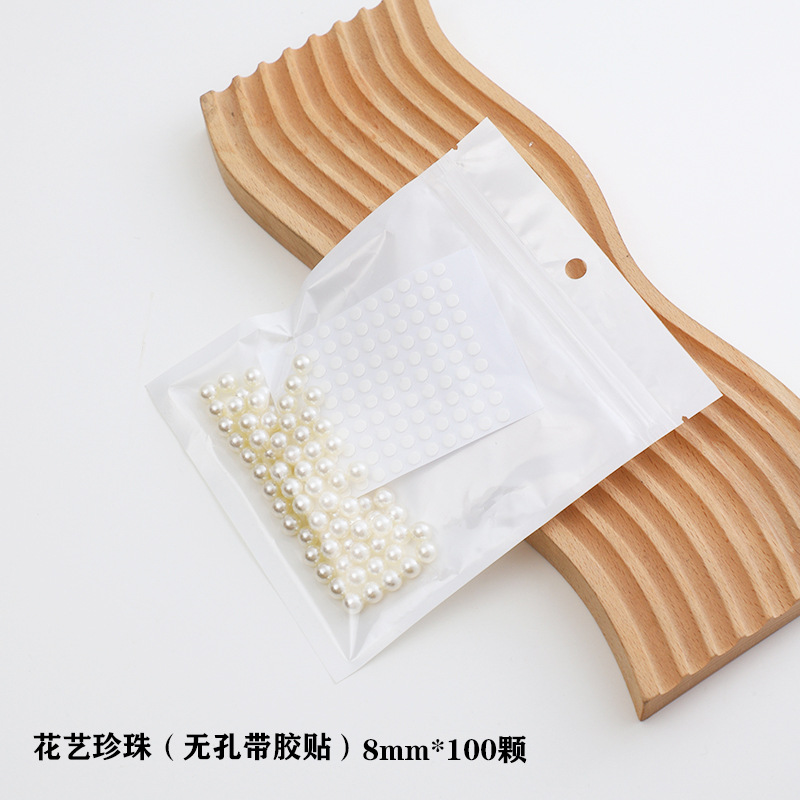 Material de embalaje de flores al por mayor nuevo estilo Chanel de una sola pieza que forma pieza redonda ramo bolsa de tela flor artefacto