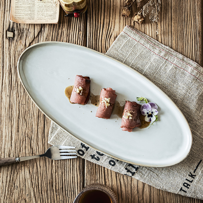 Estilo nórdico simple platos de cerámica oval casero plato de pescado al vapor horno de sushi plato de alta sensación