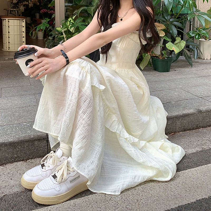 Деревянное платье с подвесной ушей женское лето 2024 новое сладкое французское чувство талии супер сказочная длинная юбка