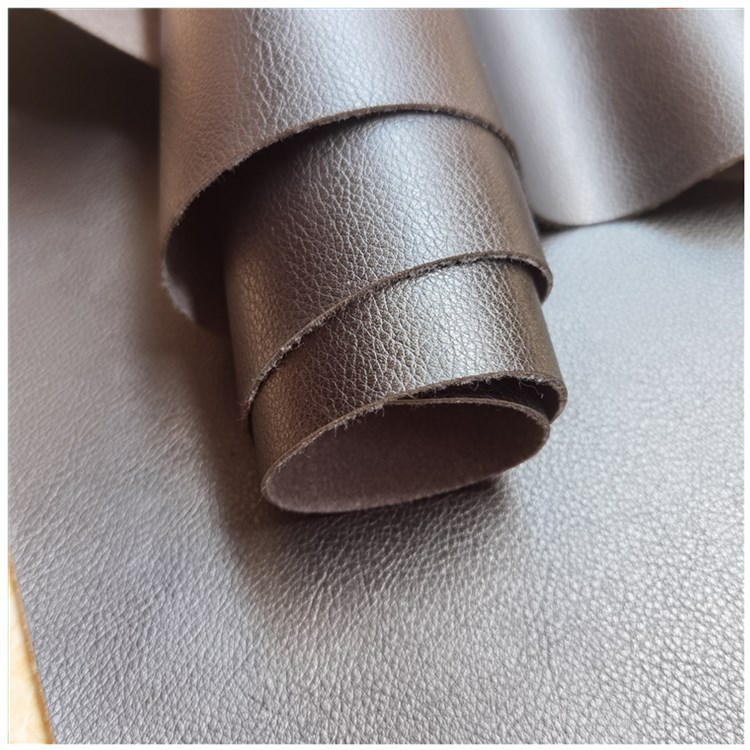 现货供应人造革PU皮革太空荔枝纹运动鞋材体育用品箱包表带商标革