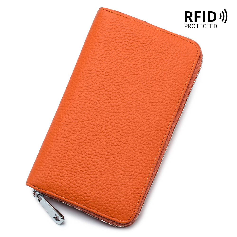 Pasaporte bolsa cremallera de cuero multifuncional familia plegable Bolsa japonesa transfronteriza de las mujeres largas patrón de lichí Cartera de color sólido