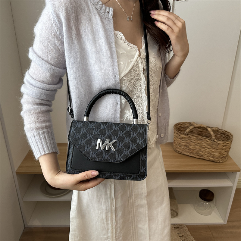 Nueva bolsa de hombro 2026 primavera y verano nuevo nicho de diseño bolso de mochila de moda simple bolso de tendencia de mujer