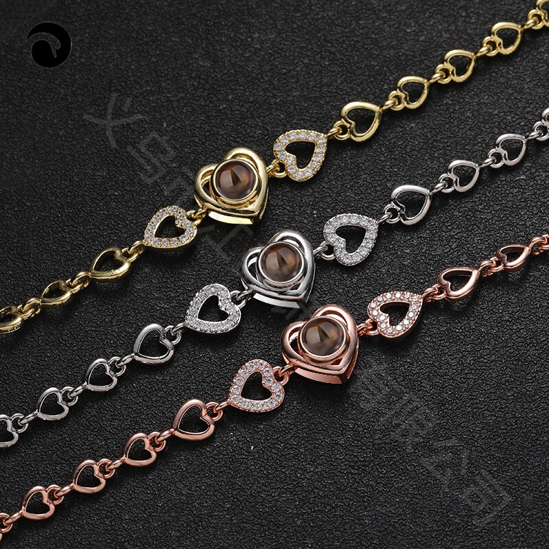 New 100 languages I love you micro-carved Diamond-embedded love projection S925 bracelet female hollow Chinese Valentine's Day gift New 100 languages I love you micro-carved Diamond-embedded love projection S925 bracelet female hollow Chinese Valentine's Day gift