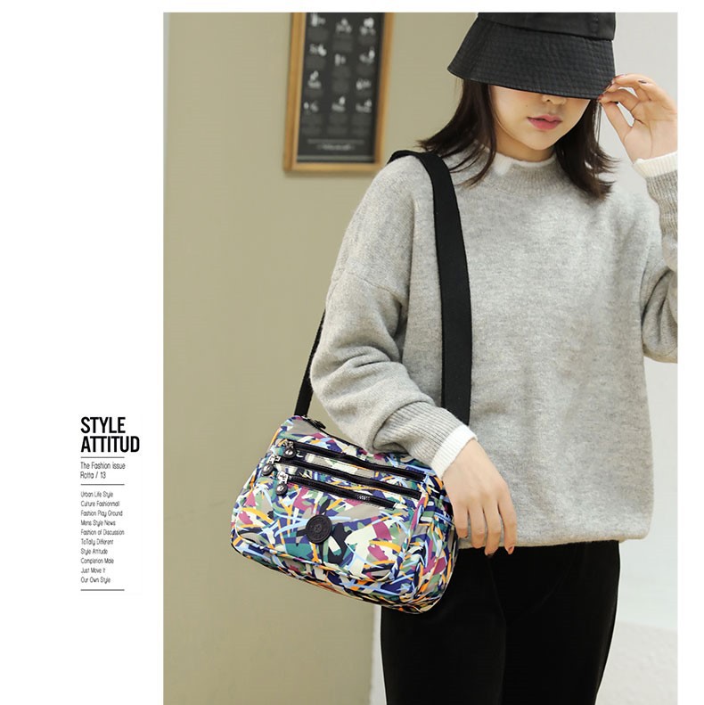 2023 nueva gran capacidad impresa bolso de hombro de las mujeres temperamento de moda nicho bolsa de mensajero simple estilo occidental bolsa de todo fósforo