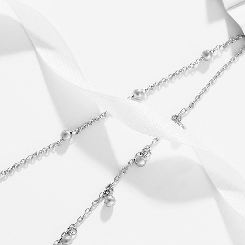 Xupar joyería europea y americana simple moda pulsera de doble capa aleación blanco redondo borla personalizada pulsera de estilo frío para las mujeres