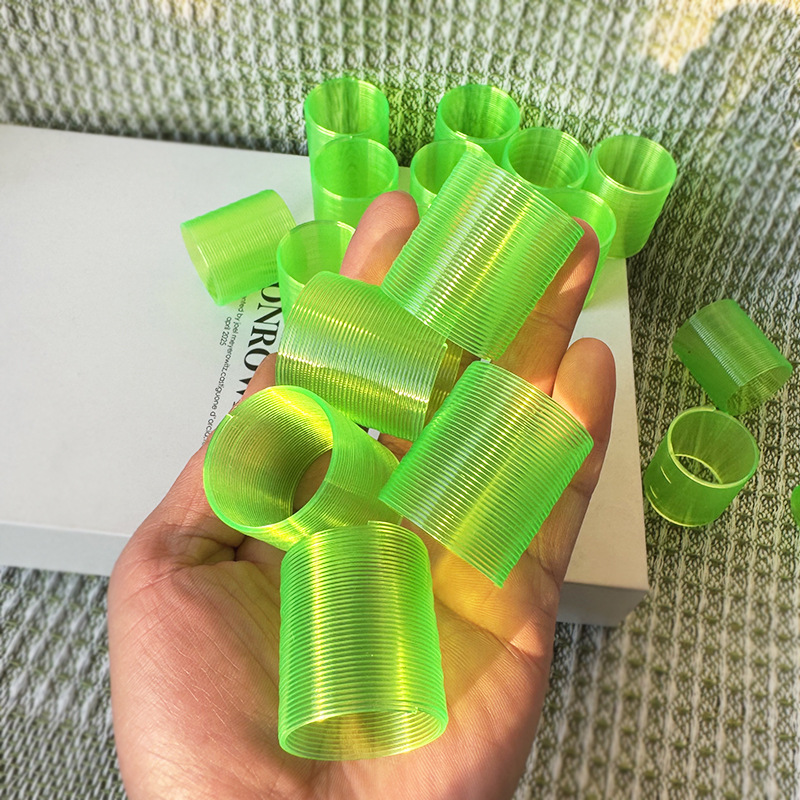 New Hot-Selling Smiley Rainbow Circle Wholesale Children's Educational Spring Toy Cartoon Stacking Circle Kindergarten Small Gift