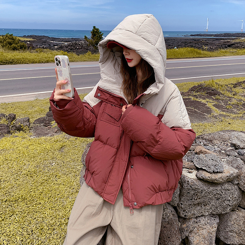 2025 nuevo invierno nuevo algodón mujer corto encapuchado empalme de color contraste grueso chaqueta suelta moda