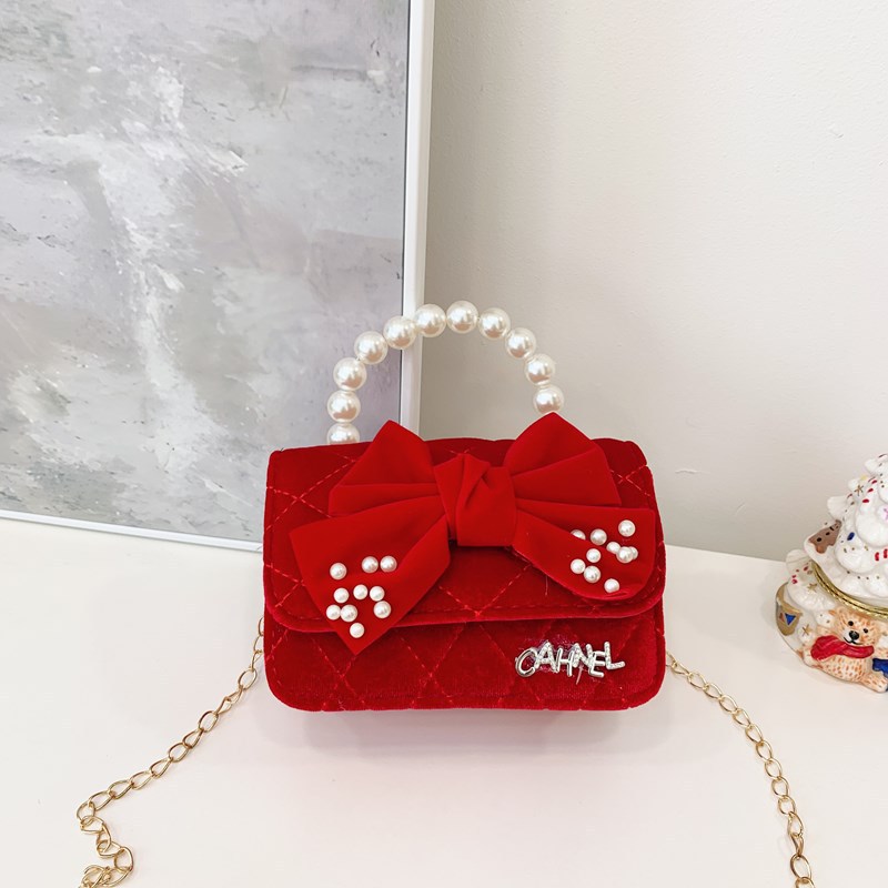 Bolso de niños nuevo bolso de perla rojo de Año Nuevo lindos princesas niñas bolso de hombro de cadena de estilo extranjero bolso de mochila