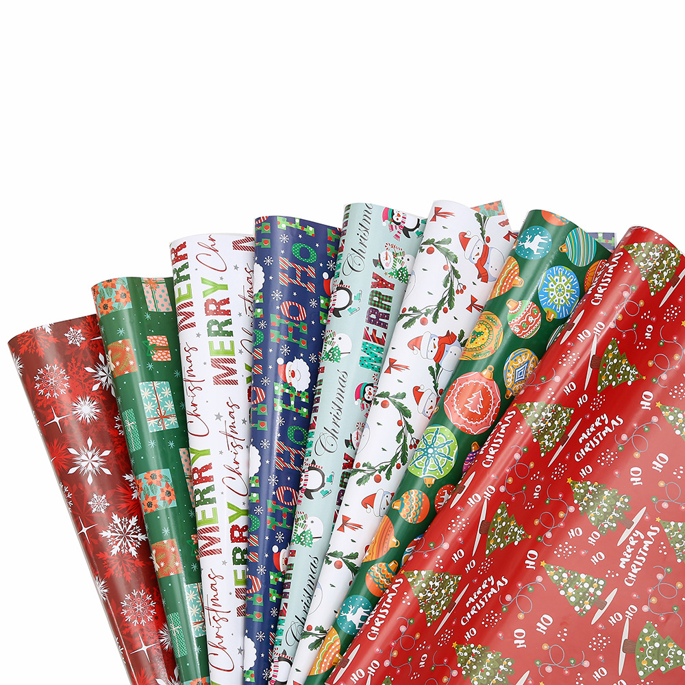 Nuevo papel de embalaje de papel de bronce de Navidad Papá Noel dibujos animados copo de nieve alce impresión de regalo embalaje de regalo