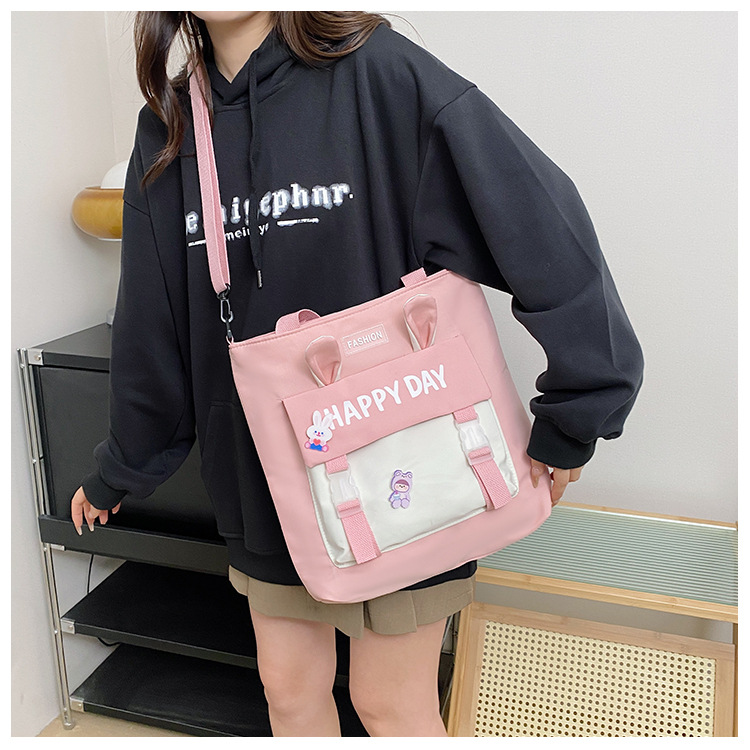 Large-capacity file bag, primary school student handbag that can be carried on one shoulder, book bag for girls with high appearance standards, homework books and test papers bag undefined
